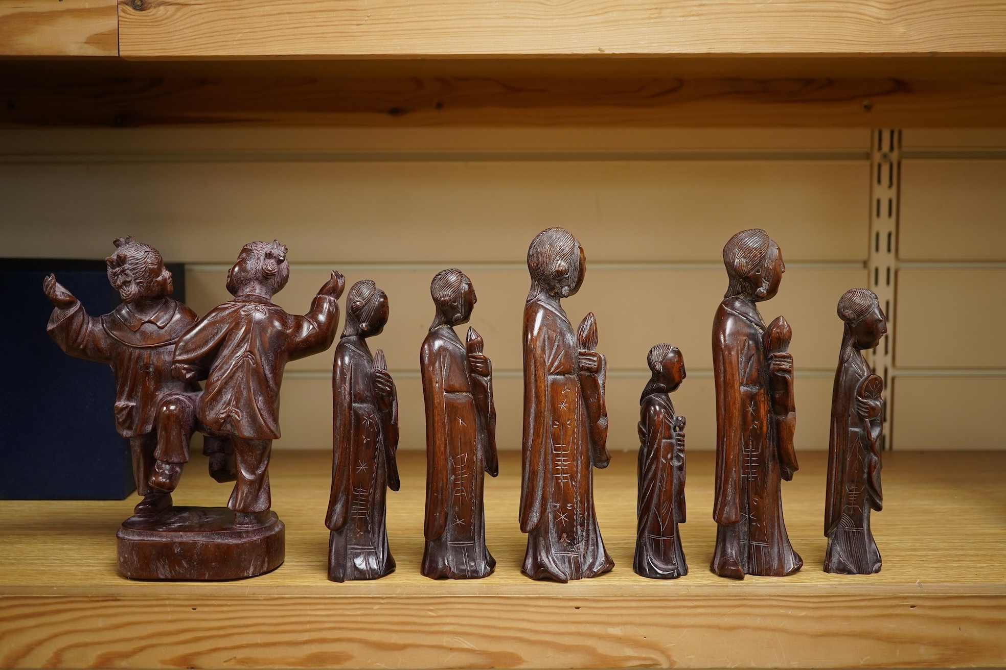 Six mid 20th century Chinese carved wood figures holding lotus and a Cultural Revolution carving of turin girls (7) tallest 21cm